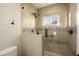 Large walk-in shower with tile surround at 2235 E Vista Ave, Phoenix, AZ 85020