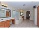 Large Primary bathroom with soaking tub, double vanity, and block glass window at 22830 N 32Nd Ln, Phoenix, AZ 85027