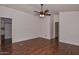 Spacious bedroom with wood floors and ceiling fan at 22830 N 32Nd Ln, Phoenix, AZ 85027