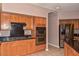 Kitchen with double oven and stainless steel fridge at 22830 N 32Nd Ln, Phoenix, AZ 85027