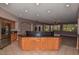 Large kitchen island with granite countertop at 22830 N 32Nd Ln, Phoenix, AZ 85027