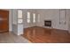 Bright living room featuring hardwood floors and a fireplace at 22830 N 32Nd Ln, Phoenix, AZ 85027