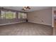 Spacious living room with tile floors and ceiling fan at 22830 N 32Nd Ln, Phoenix, AZ 85027