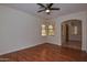 Bright living room with hardwood floors and access to entryway at 22830 N 32Nd Ln, Phoenix, AZ 85027