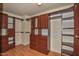 Large walk-in closet with ample shelving and drawers at 22830 N 32Nd Ln, Phoenix, AZ 85027