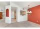 Bright dining room features a chandelier and an accent wall at 23570 N 75Th N St, Scottsdale, AZ 85255