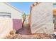 Landscaped side yard with gravel and cactus at 23570 N 75Th N St, Scottsdale, AZ 85255