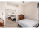 Bright bedroom with mirrored closet doors and dresser at 24029 N 76Th Pl, Scottsdale, AZ 85255