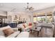 Bright and airy living room with large windows and comfortable furnishings at 24029 N 76Th Pl, Scottsdale, AZ 85255