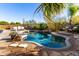 Freeform pool with a spa and plenty of room for lounging at 24029 N 76Th Pl, Scottsdale, AZ 85255