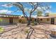 Spacious backyard with large tree, patio, and detached studio at 2434 E Pinchot Ave, Phoenix, AZ 85016