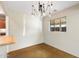 Dining area with polished concrete floors and unique lighting at 2434 E Pinchot Ave, Phoenix, AZ 85016