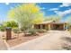 Cute bungalow with a carport and nicely landscaped front yard at 2434 E Pinchot Ave, Phoenix, AZ 85016