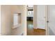 Bright hallway with built-in shelving and neutral walls at 2434 E Pinchot Ave, Phoenix, AZ 85016