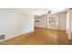 Spacious living room with polished concrete floors and ceiling fan at 2434 E Pinchot Ave, Phoenix, AZ 85016