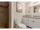 Clean bathroom with granite vanity and shower at 313 W Saddle Mountain Rd, Phoenix, AZ 85086