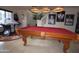 Finished game room featuring a pool table and foosball table with neutral tile floors at 31689 N Blackfoot Dr, San Tan Valley, AZ 85143