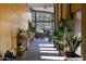 Lobby with wood wall, large window, and plants at 33108 N 72Nd Way, Scottsdale, AZ 85266