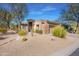 Single-story home with desert landscaping and stone accents at 33108 N 72Nd Way, Scottsdale, AZ 85266