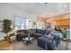 Spacious living room featuring a large sectional sofa and coffee table at 33108 N 72Nd Way, Scottsdale, AZ 85266