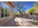 Outdoor patio with fireplace and tile flooring at 33108 N 72Nd Way, Scottsdale, AZ 85266