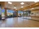 Yoga studio with hardwood floors, mirrors, and natural light at 33108 N 72Nd Way, Scottsdale, AZ 85266