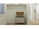 Well-lit laundry room with a convenient hamper and shelving at 3350 S 82Nd St, Mesa, AZ 85212