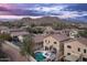 Aerial view showing house with pool and surrounding mountain views at 33610 N 26Th Ave, Phoenix, AZ 85085