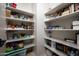 Well-organized pantry with ample shelving for storage at 33610 N 26Th Ave, Phoenix, AZ 85085