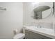 Updated bathroom with gray vanity and oval mirror at 3491 N Arizona Ave # 54, Chandler, AZ 85225