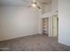 Bright bedroom with ceiling fan and built-in shelving at 3491 N Arizona Ave # 54, Chandler, AZ 85225