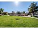 Landscaped lawn with a gazebo and walkways, providing a relaxing community space at 3491 N Arizona Ave # 54, Chandler, AZ 85225