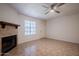 Living room with fireplace and tiled floors at 3491 N Arizona Ave # 54, Chandler, AZ 85225