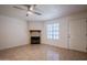 Living room with fireplace and tiled floors at 3491 N Arizona Ave # 54, Chandler, AZ 85225