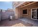 Private patio with covered area and gravel flooring at 3491 N Arizona Ave # 54, Chandler, AZ 85225