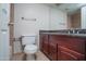 Bathroom with double sinks and wood vanity at 3535 W Tierra Buena Ln # 156, Phoenix, AZ 85053