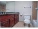 Bathroom boasts double sinks and dark wood vanity at 3535 W Tierra Buena Ln # 156, Phoenix, AZ 85053