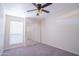 Spacious bedroom with mirrored closet and ceiling fan at 3535 W Tierra Buena Ln # 156, Phoenix, AZ 85053