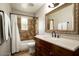 Updated bathroom with tub and shower combo at 3601 N 48Th Way, Phoenix, AZ 85018