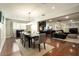 Elegant dining room with hardwood floors and a view into the living room at 3601 N 48Th Way, Phoenix, AZ 85018