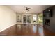 Living room with hardwood floors, fireplace and sliding glass doors at 3601 N 48Th Way, Phoenix, AZ 85018