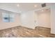 Bright entryway with wood-look tile flooring at 36530 W Leonessa Ave, Maricopa, AZ 85138