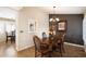 Bright dining room featuring a wood table and stylish decor at 3720 E South Fork Dr, Phoenix, AZ 85044