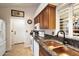 Well-equipped kitchen with granite countertops and copper sink at 3720 E South Fork Dr, Phoenix, AZ 85044