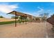 Play area with swings and shade structure at 3720 E South Fork Dr, Phoenix, AZ 85044