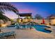 Relaxing pool area with patio furniture and spa at 3720 E South Fork Dr, Phoenix, AZ 85044