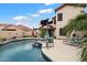 Spacious pool and spa with ample patio space at 3720 E South Fork Dr, Phoenix, AZ 85044