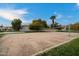 Outdoor sand volleyball court with surrounding green space at 3720 E South Fork Dr, Phoenix, AZ 85044