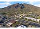 Community view showcasing the complex near a main road and mountains at 37222 N Tom Darlington Dr # 2, Carefree, AZ 85377