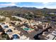 Aerial view of community with pool and mountain views at 37222 N Tom Darlington Dr # 2, Carefree, AZ 85377